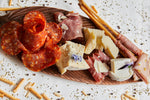 Planche mixte charcuteries et fromages italiens - Traiteur La Perla Paris